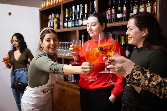 Rome Tipsy Cooking Class: Make Pasta and Mix 3 Spritz Cocktails - Mixing Aperol, Hugo, and Limoncello spritzes like a Roman