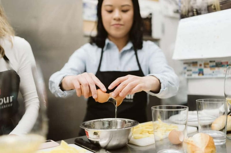 San Sebastian: Authentic Basque Cooking Class - Drinks that match the menu: cider pouring, wine, and ice apple cider
