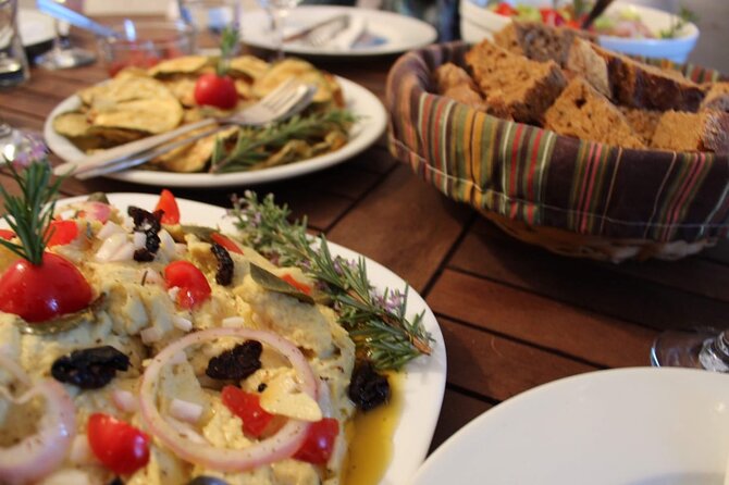 Santorini Family Farm Food & Wine Tour with Cooking Class - The farm cooking class at the cave farm: tomatoes, fava, and eggplant