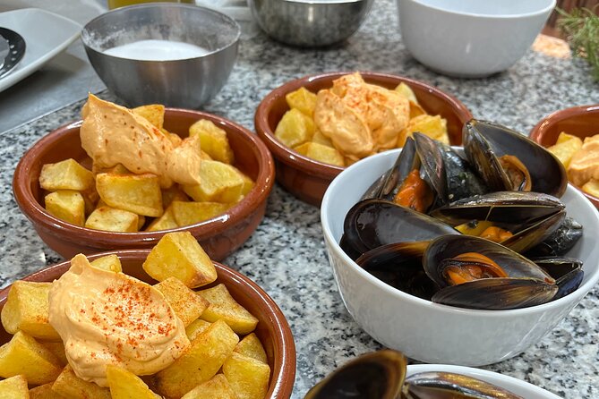 Seafood paella cooking class, tapas and visit to Ruzafa market. - Valencia Paella Starts in Ruzafa, Not in a Kitchen