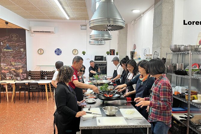 Seafood paella cooking class, tapas and visit to Ruzafa market. - Tapas and Sangria First: The Warm-Up That Makes Cooking Fun