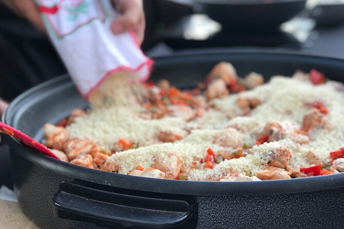 Sevilla: Rooftop Paella Cooking Class & 30-minute expert Q&A - Rooftop Paella With Cathedral Views When the Light Turns Golden