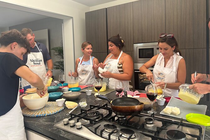 Sicilian Cooking Class Taormina Real Home & Local Genuine Flavors - Cooking the Main Dish: Tagliatelle Bolognese or Parmigiana di Melanzane