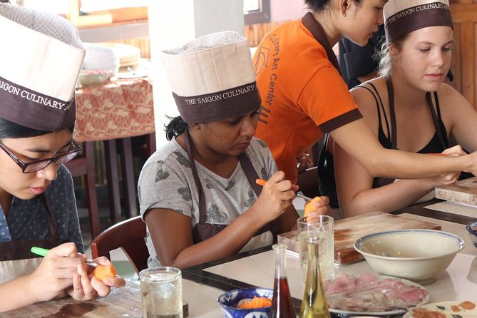 Small-group Cooking Class with Market visiting (4-5 hours) - Cyclo Pickup in District 1: A Calm Start to Saigon Flavors