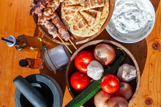 Souvlaki Cooking Class with Locals – Transfer Included - The best part: a Mykonos table, not a demo counter