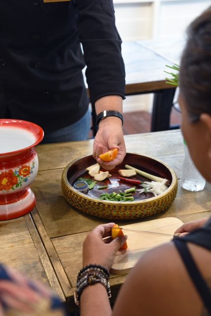 Sukhumvit: Hands-on Thai Cooking Class & Market Tour in BKK - Inside the cooking class: how you go from ingredients to four hot dishes