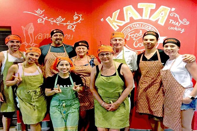 Thai Cooking Class by Kata Thai Cooking School in Phuket - Getting Your Bearings: Lemongrass Tea, Booklets, and Aprons