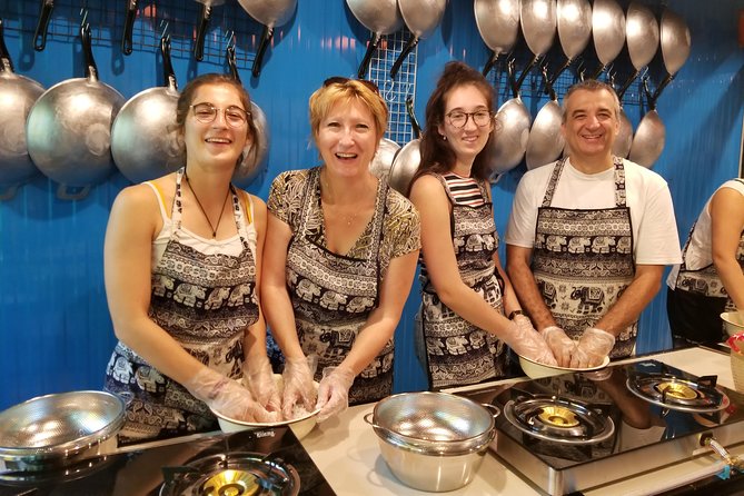 Tingly Thai Cooking Class with Morning Market Tour - At the school: hands-on Thai prep and making curry paste
