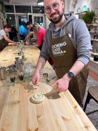 Traditional Albanian Cooking Class in Tirana & Raki Tasting - Meet the Host: Dervis, Maris, and Marius Energy