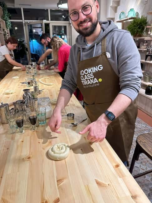 Traditional Albanian Cooking Class in Tirana & Raki Tasting - Meet the Host: Dervis, Maris, and Marius Energy