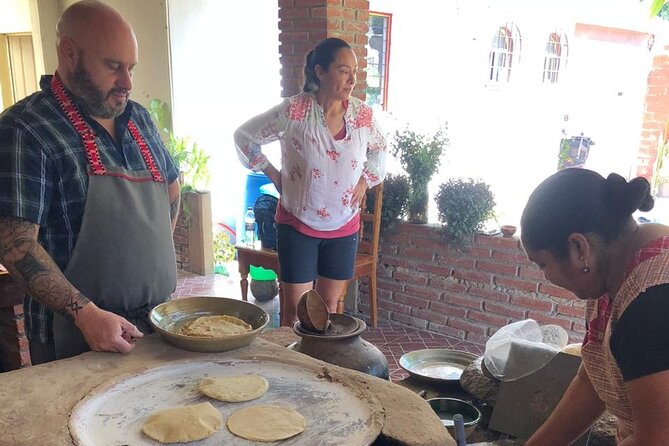 Traditional Cooking Class with Minerva Lopez - Minerva Lopez’s kitchen: wood stove, garden setting, and real instruction