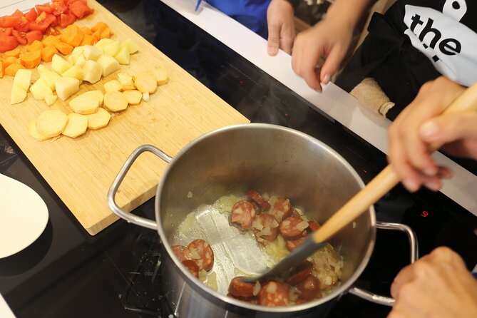 Traditional Portuguese Cooking Class: Grandma’s Secrets & Recipes - Main course comfort: pea stew with chouriço and poached eggs
