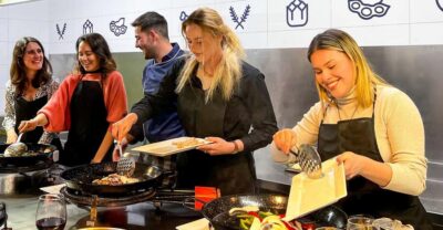 Valencia: Paella Cooking Class with Central Market Tour - The cooking station setup: hands-on, not just watching