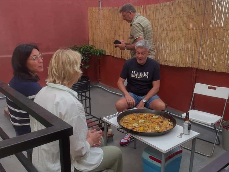 Valencia: Paella Cooking Class with Tapas and Drinks - Cooking Valencian paella from scratch: sofrito to socarrat