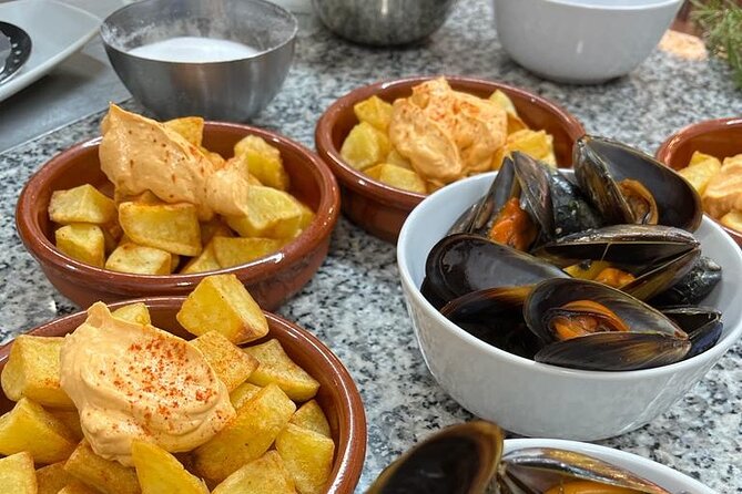 Valencian paella cooking class, tapas and visit to Ruzafa market. - Tapas and Sangria Workshop: The Best Kind of Pre-Cooking Start