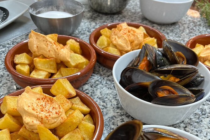 Valencian Paella Cooking Class, Tapas & Sangria - Evening - Ruzafa Market Ingredients: What You Learn About True Valencian Paella