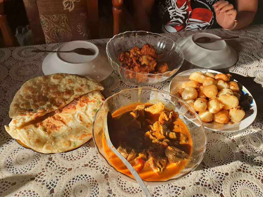Zanzibar: Walking Spice Farm with Local Cooking Class - Cooking time in an open-air hut: what you’re learning (and how it’s taught)